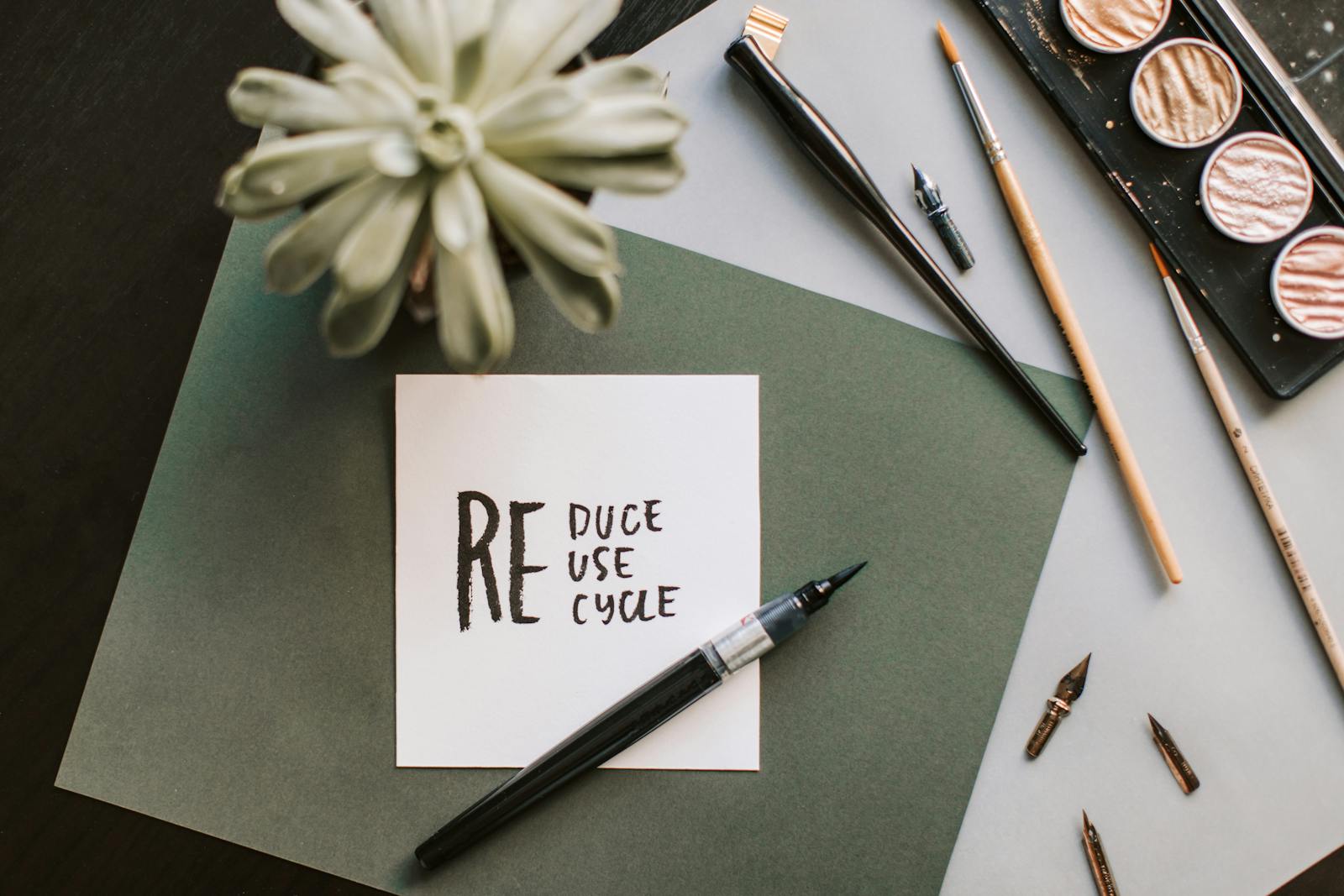 notecard that says reduce reuse recycle