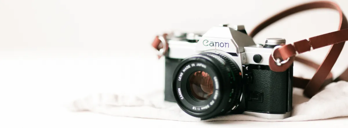 A camera sitting on a table for planning a branding photoshoot