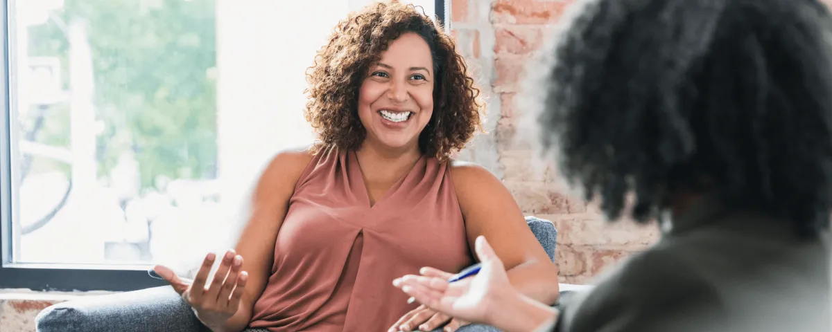 women in a therapy or counseling session