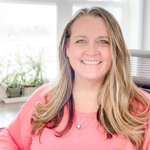 Heather Stephens, marketing coach, at her home office desk