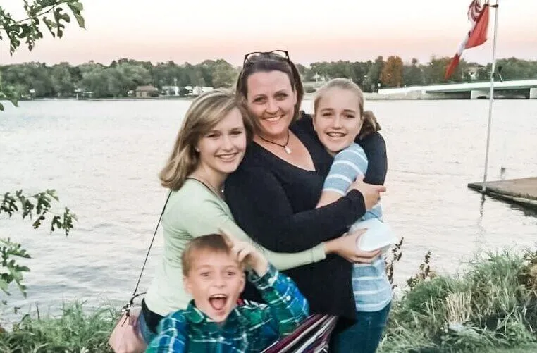 Heather with her three kids by the lake the night she quit her job