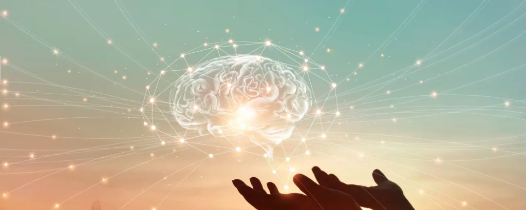 brain hologram hovering over a pair of hands