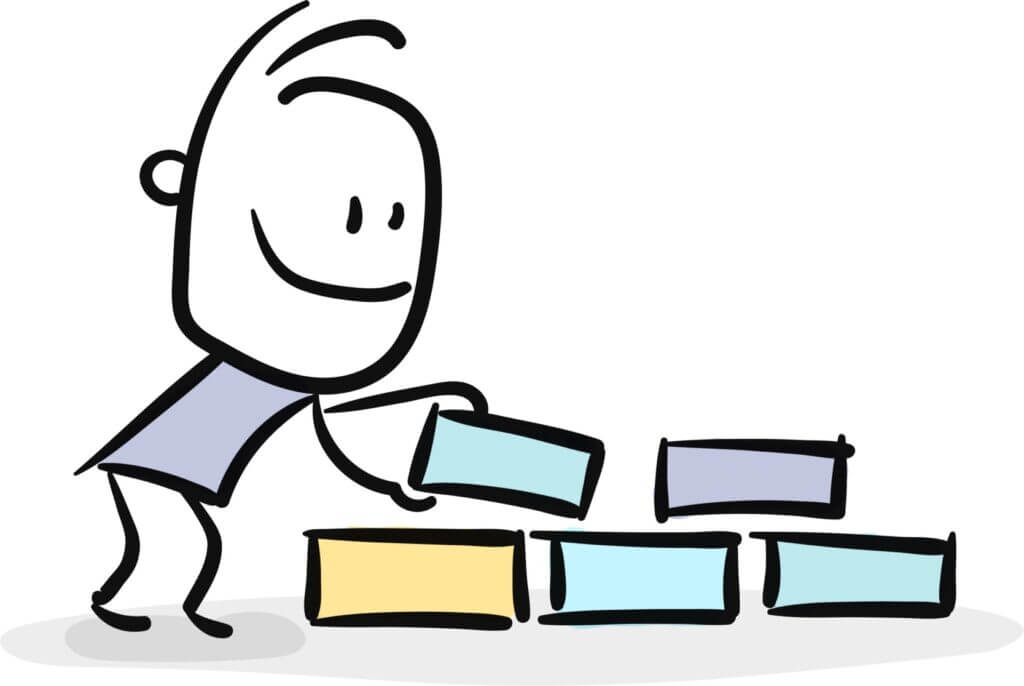 drawing of a happy cartoon boy building something with bricks