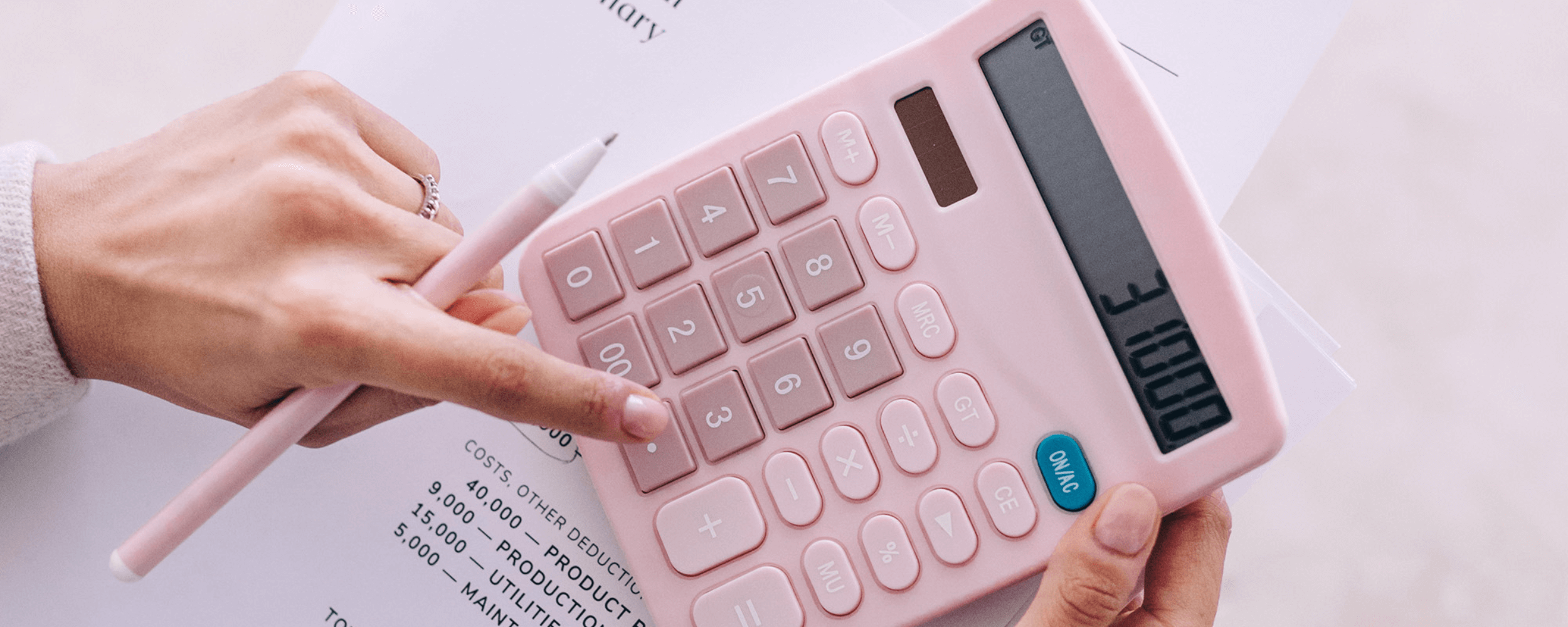 How to Price Your Coaching Services: The Lifestyle-First Method how to price your coaching services: a life coach using a calculator