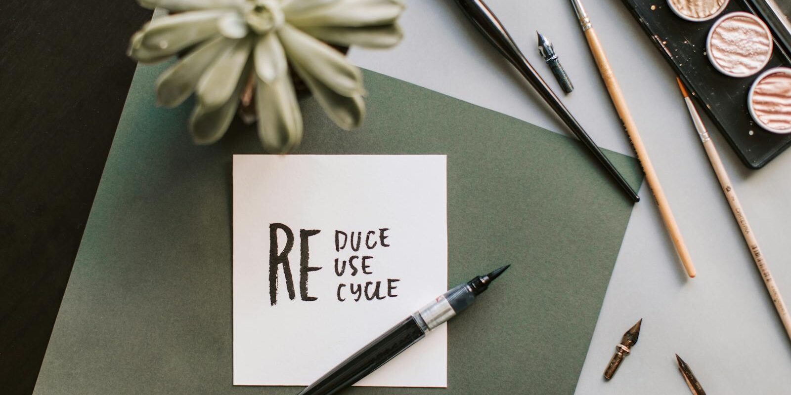 notecard that says reduce reuse recycle