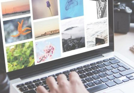 laptop showing a photo site