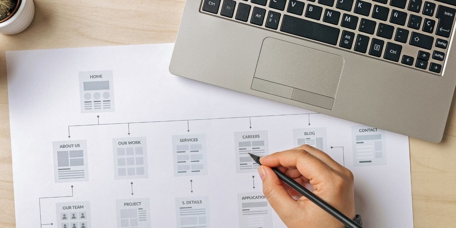 website redesign - person drawing a sitemap