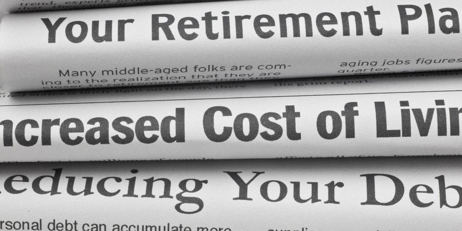 stack of newspapers showing headlines