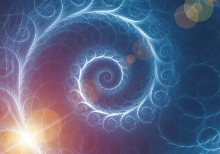Beautiful spiral on a purple and blue background with glowing gold light in the background