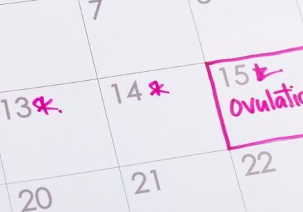 Image of calendar with ovulation day marked in pink marker for blog post image for post "Hormones and Marketing: How to Work with Your Body’s Rhythms for Maximum Results with Minimal Stress"