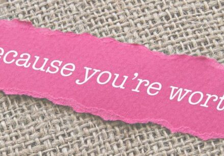 slip of paper that says "because you're worth it" for blog post How to handle the budget talk and get paid what you're worth.