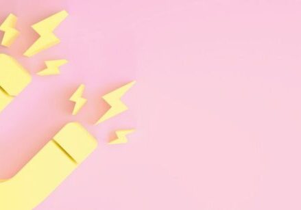 graphic illustration of a yellow magnet on a pink background for blog post "How to Deliver & Promote Your Lead Magnet"