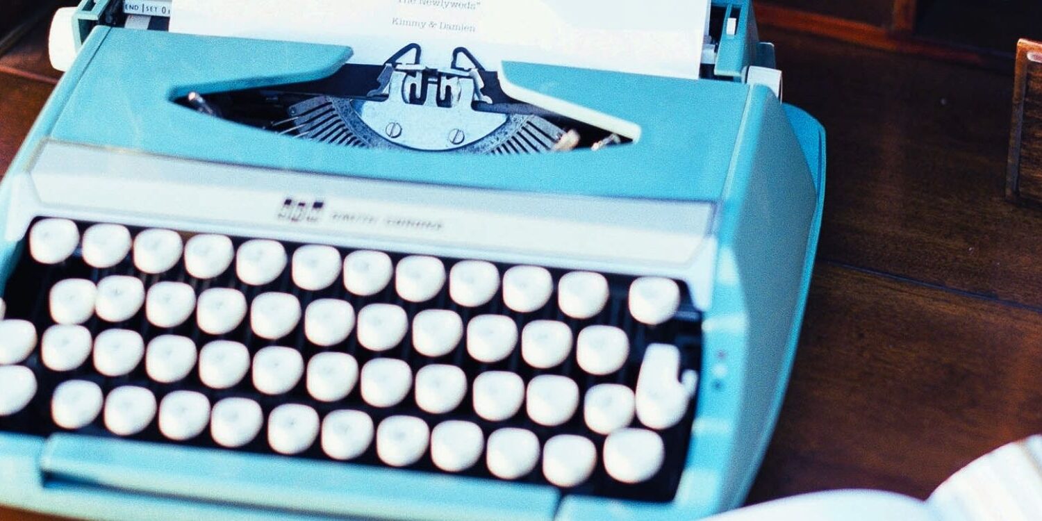 Cool old typewriter on a desk representing long-form content to grow your business in 2026