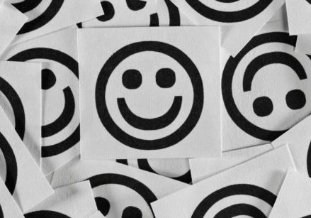 a bunch of black smile faces on white background. Surefire Ways to Improve Your Happiness as a Business Owner