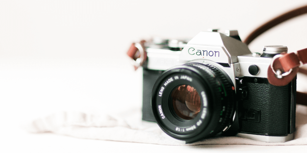 A camera sitting on a table for planning a branding photoshoot
