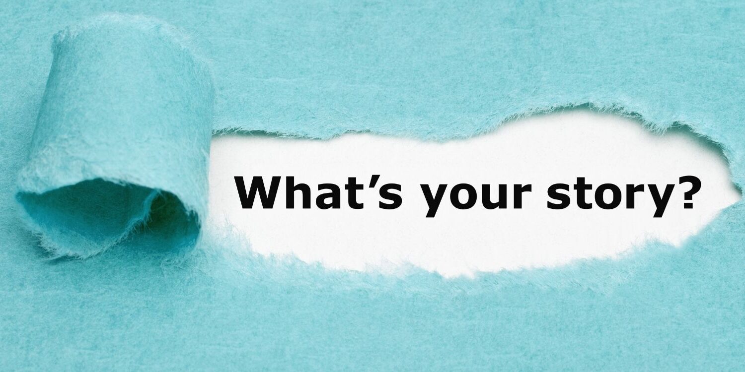 turquoise piece of paper torn to reveal "what's your story" typed on white paper behind it.