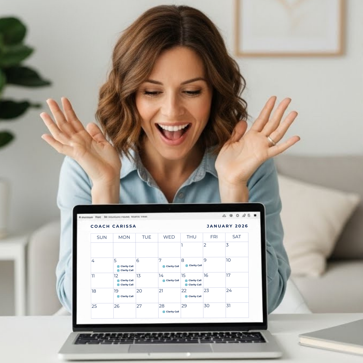 Coach looking at her calendar on her laptop showing that she's fully booked thanks to her lead magnet.