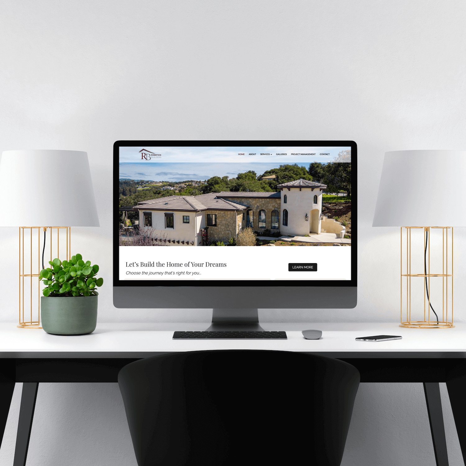 mockup of a desktop computer showing the homepage of a custom website design for a building contractor