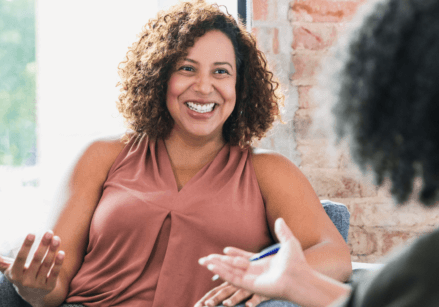 women in a therapy or counseling session