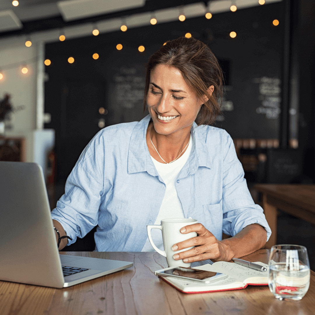 Woman enjoying working with peace of mind from her Peace of Mind WordPress Website Maintenance plan